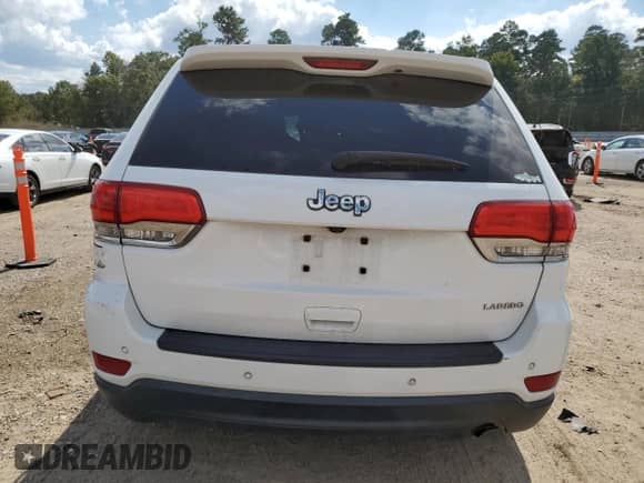 2019 Jeep Grand Cherokee Laredo E with VIN 1C4RJEAG9KC598264, listed as a Copart auction lot 87252015 with 101,546 mi miles and Salvage title. Bid and sale history available at DreamBid. Image 6.