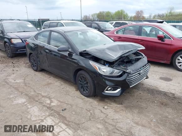 2019 Hyundai Accent SE z VIN 3KPC24A34KE060798, wystawiony jako IAAI lot #42117484 z przebiegiem 102 601 mil mil oraz . Historia ofert i sprzedaży dostępna na DreamBid. Obrazek 1.