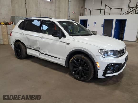 2021 Volkswagen Tiguan SE z VIN 3VV2B7AX6MM014559, wystawiony jako Copart lot #82043345 z przebiegiem 71 469 mil mil oraz Szkoda całkowita • Salvage title. Historia ofert i sprzedaży dostępna na DreamBid. Obrazek 4.