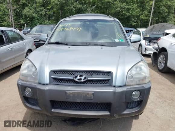 2007 Hyundai Tucson SE z VIN KM8JN12D57U617338, wystawiony jako IAAI lot #42968779 z przebiegiem 164 153 mil mil oraz . Historia ofert i sprzedaży dostępna na DreamBid. Obrazek 6.