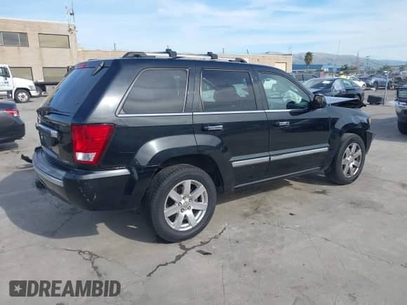 2009 Jeep Grand Cherokee with VIN 1J8HS68T49C524111, listed as a IAAI auction lot 41605917 with 133,441 mi miles and . Bid and sale history available at DreamBid. Image 4.
