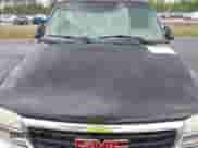 2006 GMC Sierra 1500 SLT with VIN 2GTEK13T561232618, listed as a IAAI auction lot 42086899 with 310,473 mi miles and . Bid and sale history available at DreamBid. Image 13.