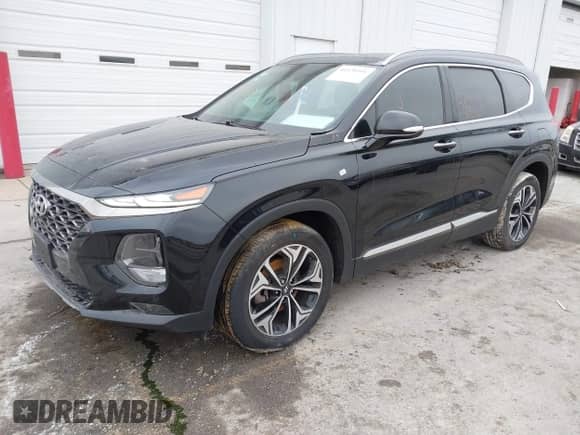 2019 Hyundai Santa Fe Ultimate с VIN 5NMS5CAA8KH019109, выставлен на аукционе IAAI как лот 41120391 с пробегом 101 829 миль миль и . История ставок и продаж доступна на DreamBid. Изображение 2.