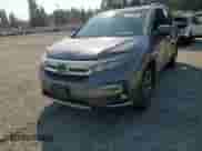2020 Honda Pilot Touring 8-Passenger z VIN 5FNYF6H92LB012101, wystawiony jako Copart lot #71325235 z przebiegiem 11 891 mil mil oraz Szkoda całkowita • Salvage title. Historia ofert i sprzedaży dostępna na DreamBid. Obrazek 14.