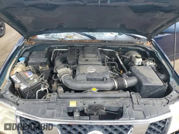 2007 Nissan Frontier SE with VIN 1N6AD09U67C407812, listed as a Copart auction lot 82100195 with 166,096 mi miles and Salvage title. Bid and sale history available at DreamBid. Image 11.