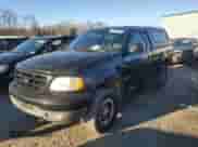2002 Ford F-150 XL z VIN 1FTRF18232NA58109, wystawiony jako Copart lot #88929065 z przebiegiem 148 228 mil mil oraz Szkoda całkowita • Salvage title. Historia ofert i sprzedaży dostępna na DreamBid. Obrazek 1.