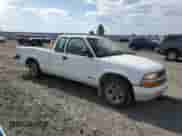 1998 Chevrolet S-10 LS with VIN 1GCCS1941W8127854, listed as a Copart auction lot 56766795 with 137,104 mi miles and Salvage title. Bid and sale history available at DreamBid. Image 4.