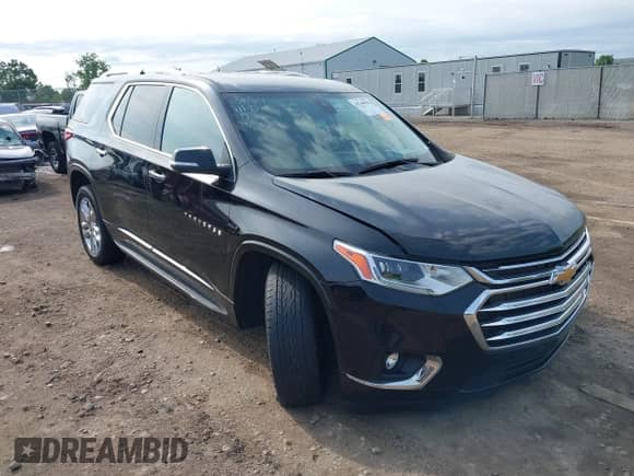 2021 Chevrolet Traverse High Country z VIN 1GNEVNKW9MJ250043, wystawiony jako IAAI lot #42769955 z przebiegiem 33 010 mil mil oraz . Historia ofert i sprzedaży dostępna na DreamBid. Obrazek 1.