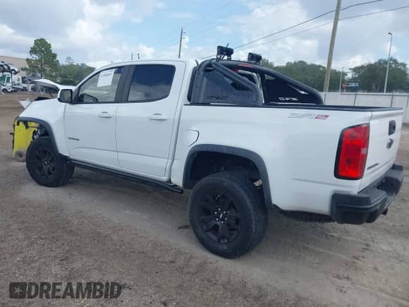 2020 Chevrolet Colorado 4WD ZR2 z VIN 1GCGTEEN0L1222317, wystawiony jako IAAI lot #43386893 z przebiegiem 80 797 mil mil oraz . Historia ofert i sprzedaży dostępna na DreamBid. Obrazek 3.