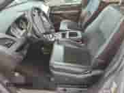 2016 Dodge Grand Caravan SXT z VIN 2C4RDGCG1GR359581, wystawiony jako Copart lot #84735725 z przebiegiem 102 637 mil mil oraz Szkoda całkowita • Salvage title. Historia ofert i sprzedaży dostępna na DreamBid. Obrazek 7.