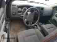 2006 Dodge Dakota ST z VIN 1D7HW28N46S517804, wystawiony jako Copart lot #83544284 z przebiegiem Nie podano mil oraz Szkoda całkowita • Salvage title. Historia ofert i sprzedaży dostępna na DreamBid. Obrazek 8.