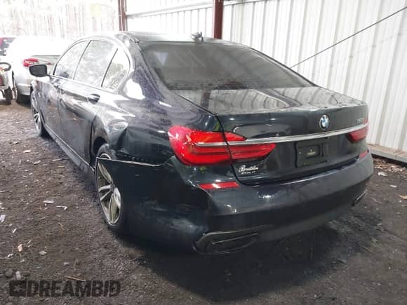 2016 BMW 7 Series 750i xDrive with VIN WBA7F2C50GG418511, listed as a IAAI auction lot 41695547 with 98,858 mi miles and . Bid and sale history available at DreamBid. Image 3.