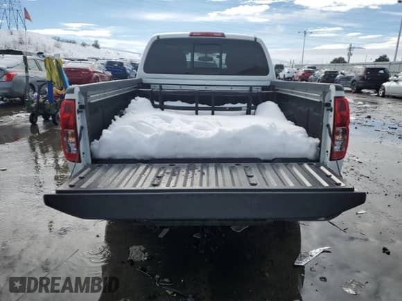 2020 Nissan Frontier SV with VIN 1N6ED0FBXLN704102, listed as a Copart auction lot 79829184 with 65,527 mi miles and Salvage title. Bid and sale history available at DreamBid. Image 6.