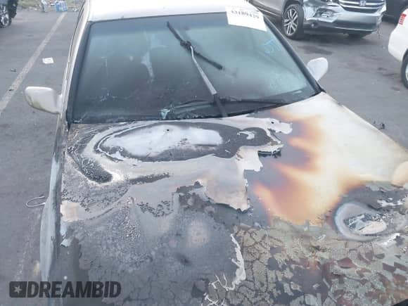 1997 Toyota Camry LE z VIN 4T1BG22KXVU787551, wystawiony jako IAAI lot #43189429 z przebiegiem Nie podano mil oraz . Historia ofert i sprzedaży dostępna na DreamBid. Obrazek 12.