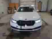 2017 BMW 7 Series 740e xDrive with VIN WBA7J2C38HG497960, listed as a Copart auction lot 58901035 with 128,262 mi miles and Salvage title. Bid and sale history available at DreamBid. Image 5.