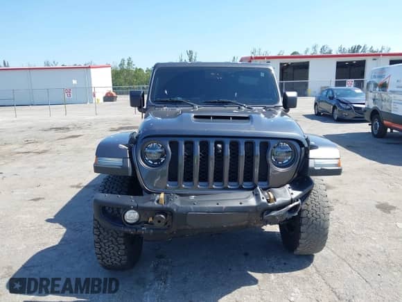 2021 Jeep Wrangler Unlimited Rubicon 392 с VIN 1C4JJXSJ9MW774508, выставлен на аукционе IAAI как лот 42280804 с пробегом 36 084 миль миль и . История ставок и продаж доступна на DreamBid. Изображение 12.