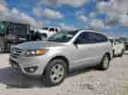 2012 Hyundai Santa Fe GLS z VIN 5XYZGDAB6CG115498, wystawiony jako Copart lot #82282945 z przebiegiem 182 883 mil mil oraz Czysty tytuł • Clean title. Historia ofert i sprzedaży dostępna na DreamBid. Obrazek 1.