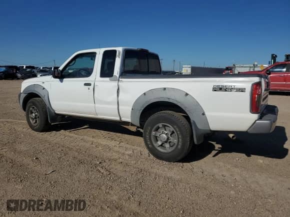 2002 Nissan Frontier XE z VIN 1N6ED26T52C366879, wystawiony jako Copart lot #67726024 z przebiegiem 141 068 mil mil oraz Szkoda całkowita • Salvage title. Historia ofert i sprzedaży dostępna na DreamBid. Obrazek 2.