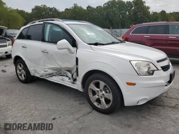 2014 Chevrolet Captiva Sport LTZ with VIN 3GNAL4EK5ES629435, listed as a Copart auction lot 82458595 with 119,160 mi miles and Salvage title. Bid and sale history available at DreamBid. Image 4.
