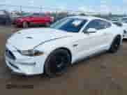 2020 Ford Mustang EcoBoost z VIN 1FA6P8TH8L5138923, wystawiony jako IAAI lot #43289295 z przebiegiem 69 708 mil mil oraz . Historia ofert i sprzedaży dostępna na DreamBid. Obrazek 17.