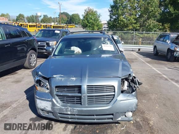 2007 Dodge Magnum R/T with VIN 2D4GV572X7H655828, listed as a IAAI auction lot 40561783 with 166,143 mi miles and . Bid and sale history available at DreamBid. Image 13.