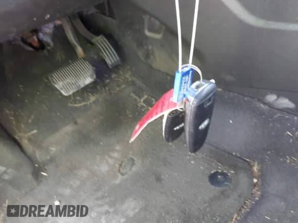 2014 Ford Focus Titanium with VIN 1FADP3N21EL136254, listed as a IAAI auction lot 43420903 with 106,629 mi miles and . Bid and sale history available at DreamBid. Image 11.