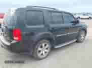 2014 Honda Pilot Touring with VIN 5FNYF3H97EB012774, listed as a IAAI auction lot 42724262 with 139,993 mi miles and . Bid and sale history available at DreamBid. Image 4.