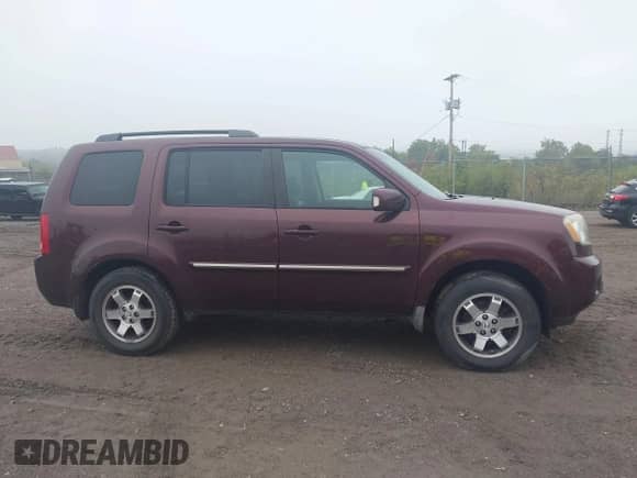 2010 Honda Pilot Touring с VIN 5FNYF4H91AB013855, выставлен на аукционе IAAI как лот 43258943 с пробегом 245 204 миль миль и . История ставок и продаж доступна на DreamBid. Изображение 13.