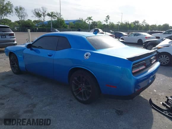 2023 Dodge Challenger GT with VIN 2C3CDZJG5PH577747, listed as a IAAI auction lot 42697245 with 24,226 mi miles and . Bid and sale history available at DreamBid. Image 3.