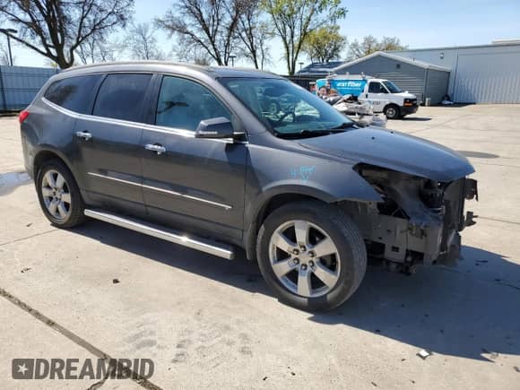 2009 Chevrolet Traverse LTZ with VIN 1GNEV33DX9S108092, listed as a Copart auction lot 49544825 with 101,586 mi miles and Salvage title. Bid and sale history available at DreamBid. Image 4.