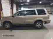 2006 Honda Pilot EX z VIN 5FNYF28466B008439, wystawiony jako IAAI lot #43479400 z przebiegiem 253 015 mil mil oraz . Historia ofert i sprzedaży dostępna na DreamBid. Obrazek 14.