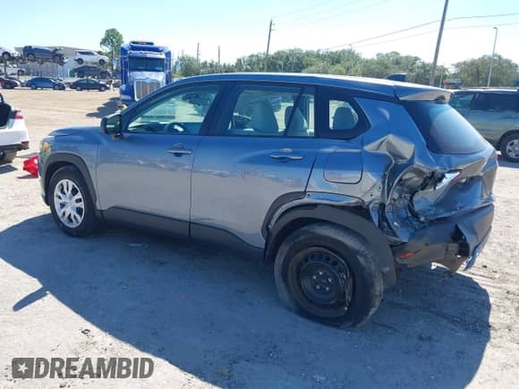 2022 Toyota Corolla Cross L with VIN 7MUAAAAG7NV029721, listed as a IAAI auction lot 43304097 with 31,139 mi miles and . Bid and sale history available at DreamBid. Image 3.