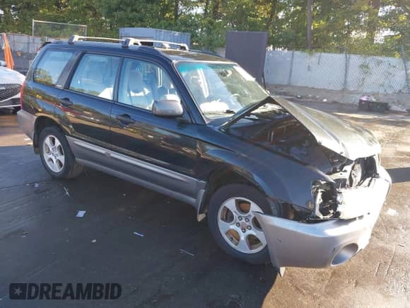 2004 Subaru Forester XS with VIN JF1SG65674H704598, listed as a IAAI auction lot 43323527 with 113,375 mi miles and . Bid and sale history available at DreamBid. Image 1.