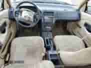 1994 Saturn SL with VIN 1G8ZH5593RZ290970, listed as a Copart auction lot 48029235 with 116,730 mi miles and Salvage title. Bid and sale history available at DreamBid. Image 8.
