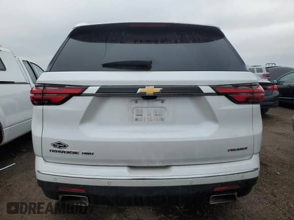 2022 Chevrolet Traverse Premier with VIN 1GNEVKKW6NJ170392, listed as a Copart auction lot 52359565 with 39,390 mi miles and Salvage title. Bid and sale history available at DreamBid. Image 6.