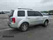 2009 Honda Pilot Touring with VIN 5FNYF38839B027611, listed as a Copart auction lot 67812505 with 148,357 mi miles and Salvage title. Bid and sale history available at DreamBid. Image 3.