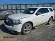 2013 Dodge Durango Citadel z VIN 1C4SDHET0DC571961, wystawiony jako IAAI lot #42050261 z przebiegiem 257 637 mil mil oraz . Historia ofert i sprzedaży dostępna na DreamBid. Obrazek 2.