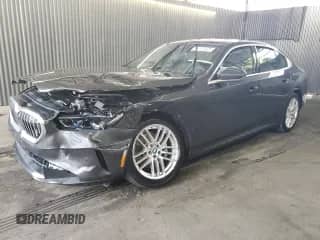 2025 BMW 5 Series 530i with VIN WBA43FJ06SCT33621, listed as a Copart auction lot 63869055 with 12,934 mi miles and Salvage title. Bid and sale history available at DreamBid. Image 1.