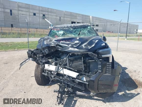 2025 Toyota Tundra SR with VIN 5TFLA5AB6SX050371, listed as a IAAI auction lot 42965187 with 289 mi miles and . Bid and sale history available at DreamBid. Image 12.