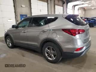 2018 Hyundai Santa Fe 2.4L z VIN 5XYZTDLB9JG539375, wystawiony jako Copart lot #87095765 z przebiegiem 149 927 mil mil oraz Czysty tytuł • Clean title. Historia ofert i sprzedaży dostępna na DreamBid. Obrazek 2.