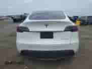 2023 Tesla Model Y Long Range с VIN 7SAYGAEE4PF693730, выставлен на аукционе Copart как лот 81366555 с пробегом 37 187 миль миль и Списание • Salvage title. История ставок и продаж доступна на DreamBid. Изображение 6.