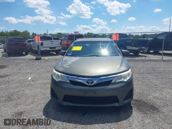2014 Toyota Camry XLE with VIN 4T4BF1FK1ER360045, listed as a IAAI auction lot 43067990 with 117,852 mi miles and . Bid and sale history available at DreamBid. Image 13.