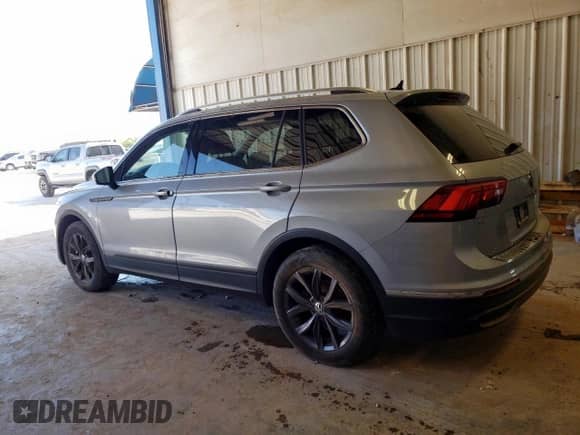 2023 Volkswagen Tiguan SE with VIN 3VVNB7AX6PM014952, listed as a Copart auction lot 64737925 with Not provided miles and Salvage title. Bid and sale history available at DreamBid. Image 2.