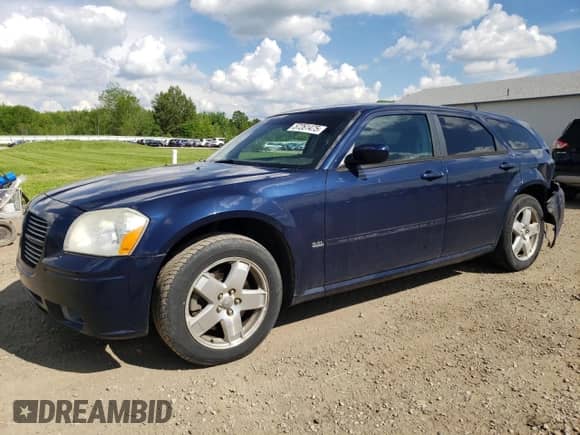 2005 Dodge Magnum SXT with VIN 2D4GZ48V05H688812, listed as a Copart auction lot 57261475 with 146,633 mi miles and Salvage title. Bid and sale history available at DreamBid. Image 1.