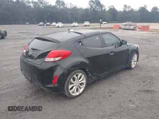 2012 Hyundai Veloster w/Black Int z VIN KMHTC6ADXCU035095, wystawiony jako IAAI lot #43573317 z przebiegiem 139 502 mil mil oraz . Historia ofert i sprzedaży dostępna na DreamBid. Obrazek 4.