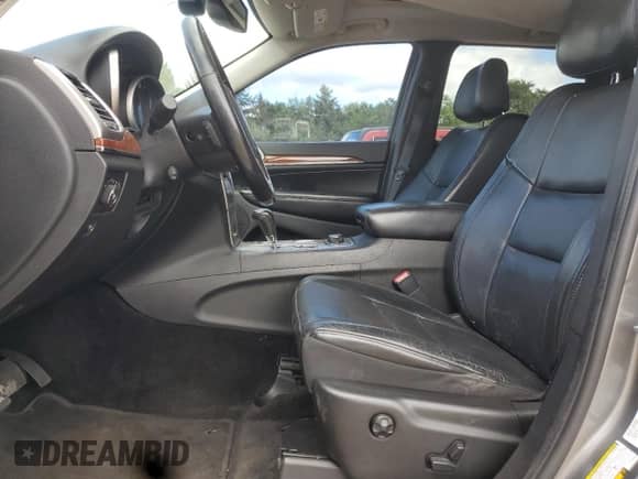 2012 Jeep Grand Cherokee Limited z VIN 1C4RJFBG5CC102608, wystawiony jako Copart lot #70375545 z przebiegiem 103 079 mil mil oraz Szkoda całkowita • Salvage title. Historia ofert i sprzedaży dostępna na DreamBid. Obrazek 7.