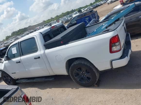 2023 Ram 1500 Big Horn with VIN 1C6SRFMT3PN636003, listed as a IAAI auction lot 42362439 with Not provided miles and . Bid and sale history available at DreamBid. Image 14.