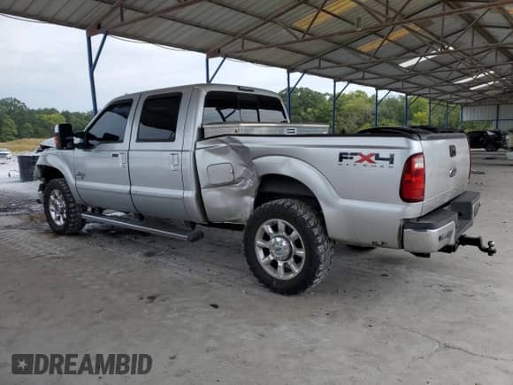 2011 Ford F-250 Lariat with VIN 1FT7W2BT5BEB24058, listed as a Copart auction lot 83944055 with 334,717 mi miles and Salvage title. Bid and sale history available at DreamBid. Image 2.