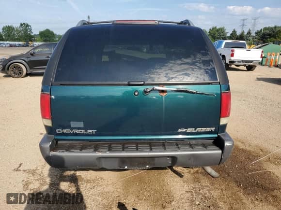 1996 Chevrolet Blazer with VIN 1GNDT13W3T2262402, listed as a Copart auction lot 62677515 with 168,312 mi miles and Salvage title. Bid and sale history available at DreamBid. Image 6.
