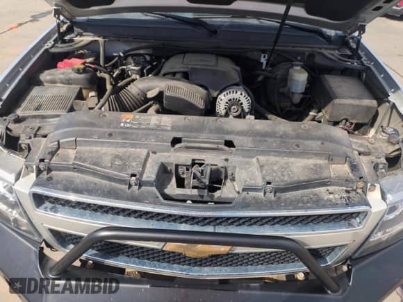 2011 Chevrolet Suburban LT z VIN 1GNSKJE32BR306182, wystawiony jako Copart lot #57253975 z przebiegiem 126 490 mil mil oraz Szkoda całkowita • Salvage title. Historia ofert i sprzedaży dostępna na DreamBid. Obrazek 12.